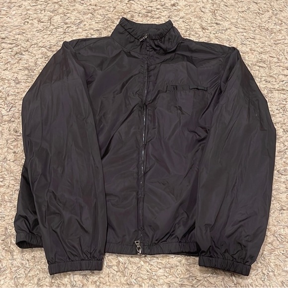 Authentic Prada windbreaker that transforms into a bag size 54
Women's
Black - Picture 3 of 16